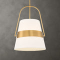 Harness, 1 Lt Pendant de Uttermost en acabado White linen shade with warm brass center support ring